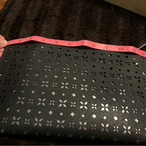 Michael Kors Women’s Floral Perforated Large Zip Clutch - Picture 11 of 13